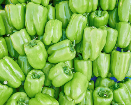 organic green bell peppers top view, natural background