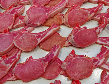 fresh raw meat steaks at the marketの写真素材