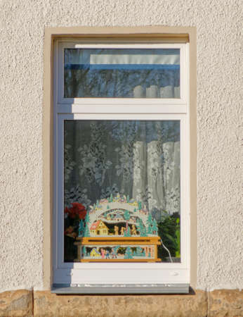 house window with Christmas decoration, Germanyの写真素材