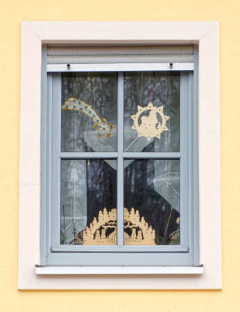Christmas decorated house window, Germanyの写真素材