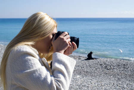 Woman taking photosの写真素材