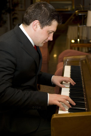 Man playing pianoの写真素材