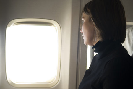 Woman traveling by air