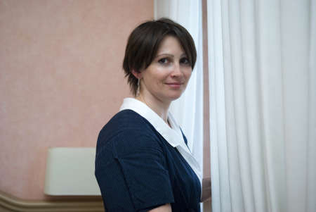 Portrait of a hotel maid の写真素材