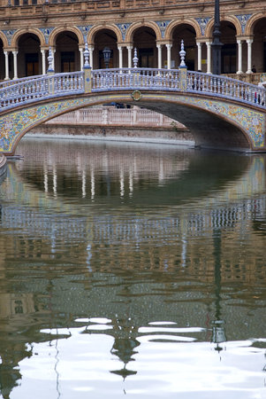 Bridge over canal in Plaza de Espana, Sevilleの写真素材