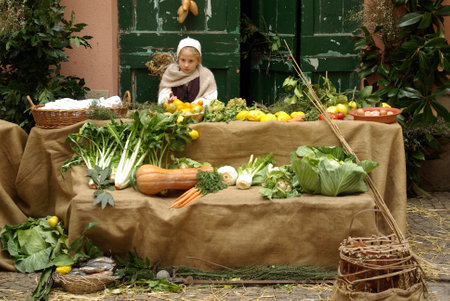 Taggia, Italy  February 28, 2010: Participant of medieval costume party. This image: Medieval marketのeditorial素材