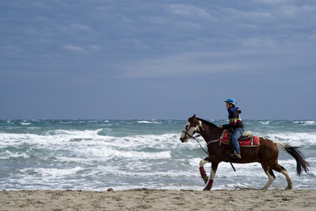 Imperia, Italy – October 10, 2010: Demonstrations amateur - Friends of the horse on the beach at...