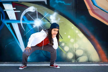 Dancing girl on a city streetの写真素材