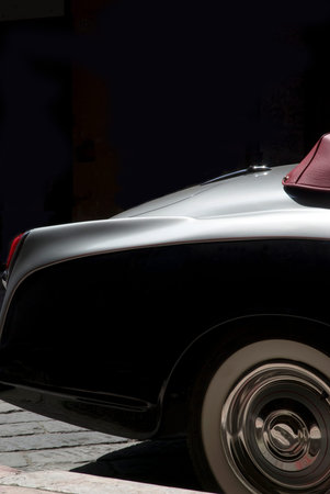 Imperia, Italy – June 7, 2014  Close up detail of a classic car cruising on the road in Imperia...