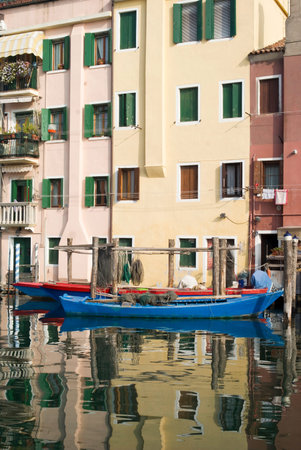 Italy, Province of Venice. Colourful ancient houses in Chioggiaの写真素材