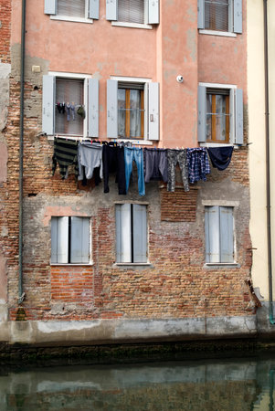 Italy, Province of Venice.  Ancient residential house in Chioggia old townのeditorial素材