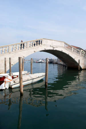 Italy, Chioggia. View Vigo bridge over Canal Venaの写真素材