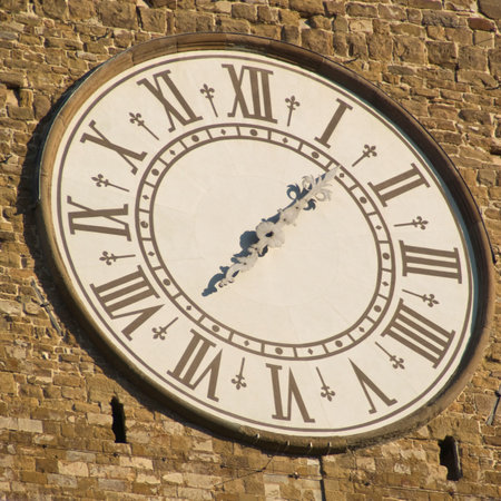 Clock tower of the Palazzo Vecchio in Florenceの写真素材