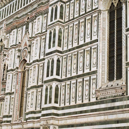 Details of the ornate marble facade at Florence Cathedralの写真素材