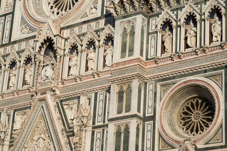 Details of the ornate marble facade at Florence Cathedralの写真素材
