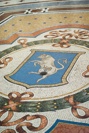 Milan, Italy - March 8, 2016: Mosaic bull in the floor of the Vittorio Emanuele Galleryのeditorial素材