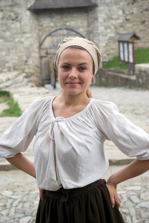 Kamyanets-Podilsky, Ukraine "May 15, 2016: Woman posing in traditional costume inside the medieval fortress of Kamyanets-Podilsky, located in the Western Ukraineのeditorial素材