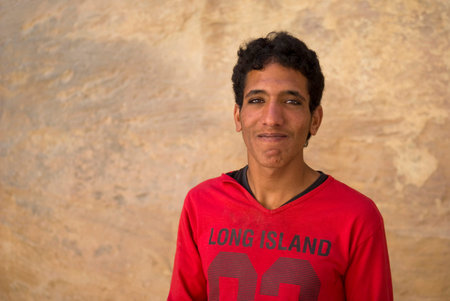 Petra, Jordan - October 26, 2016: Close up of a young Bedouin man posing at cameraのeditorial素材
