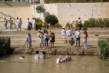 Qasr el Yahud, Israel - October 29, 2016: Religious Christians Themselves plunged into the waters of the Jordan River baptismal site of Qasr el Yahud in Israel. The baptismal site on the banks of the Jordan River, is the site where according to Functionalのeditorial素材
