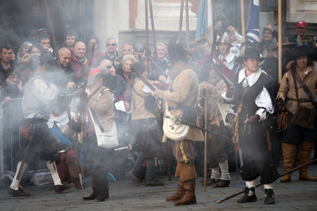 Taggia, Italy - February 26, 2017: Participants of medieval costume party in the historic city of Taggia in Liguria region of Italy. The actors acting out episodes of daily life in settings that evoke moments of life lived fully the seventeenth century. Tのeditorial素材