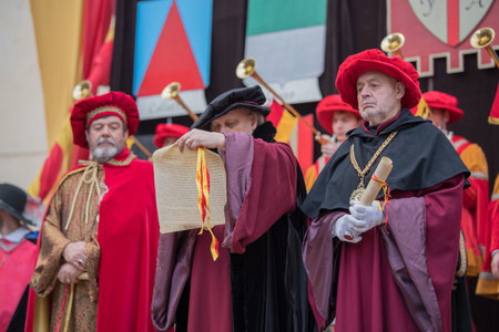 Taggia, Italy - February 26, 2017: Participants of medieval costume party in the historic city of Taggia in Liguria region of Italy. The actors acting out episodes of daily life in settings that evoke moments of life lived fully the seventeenth century. Tのeditorial素材