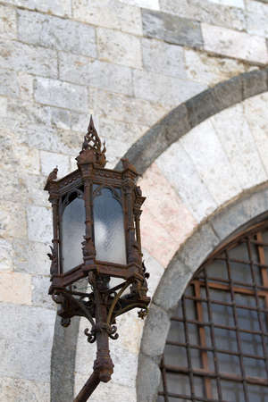Siena, Italy. Street light in Duomo Squareの写真素材