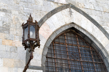 Siena, Italy. Street light on Duomo Squareの写真素材
