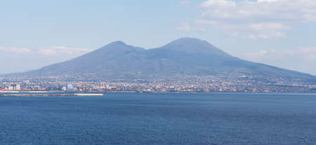 Italy, Naples, the port and the city at the foot of Vesuviusの写真素材