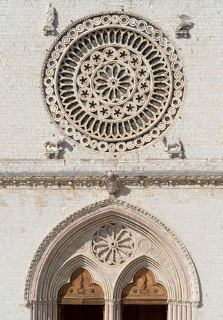 Rose window in Papal Basilica of Saint Francis of Assisi, (UNESCO World Heritage List), Umbria, Italyの写真素材