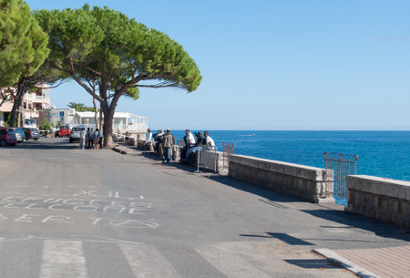 Ventimiglia, Italy - September 21, 2015: Migrants camp at the seaside near the French border in Ventimiglia, Italy. Hundreds of immigrants have headed to Ventimiglia, as French border police have started systematically turning back people crossing over ilのeditorial素材