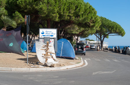 Ventimiglia, Italy - September 21, 2015: Migrants camp at the seaside near the French border in Ventimiglia, Italy. Hundreds of immigrants have headed to Ventimiglia, as French border police have started systematically turning back people crossing over ilのeditorial素材