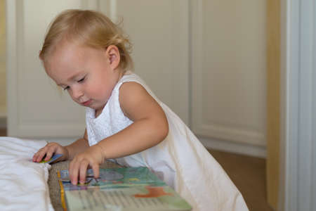 Caucasian little girl at home, close upの写真素材