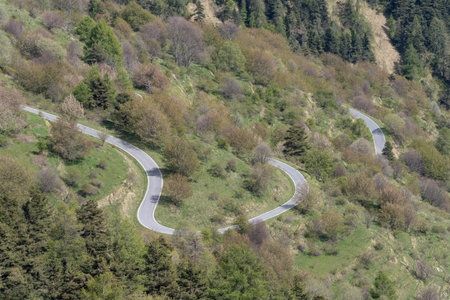 Elevated view of empty road through the mountains