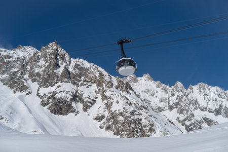Courmayeur, Italy - January 23, 2018: The cable car (Skyway Monte Bianco) on the Italian side of Mont Blanc massif. The Skyway connects the city of Courmayeur to Pointe Helbronner (3,466 m)のeditorial素材