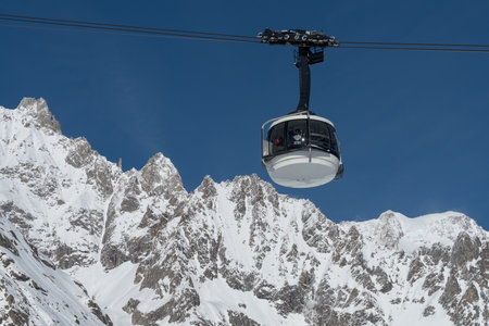 Courmayeur, Italy - January 23, 2018: The cable car (Skyway Monte Bianco) on the Italian side of Mont Blanc massif. The Skyway connects the city of Courmayeur to Pointe Helbronner (3,466 m)のeditorial素材