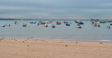 The small beach at Cascais harbour, near Lisbon, Portugalの写真素材