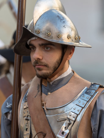 Taggia, Italy - March 17, 2018: Participant of medieval costume party in the historic city of Taggia in Liguria region of Italy. The actors acting out episodes of daily life The episodes depicted are inspired by true events, drawn from documentsのeditorial素材