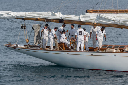 Imperia, Italy - September 9, 2018: Crew members aboard on sailboat during racing at the Paneray...