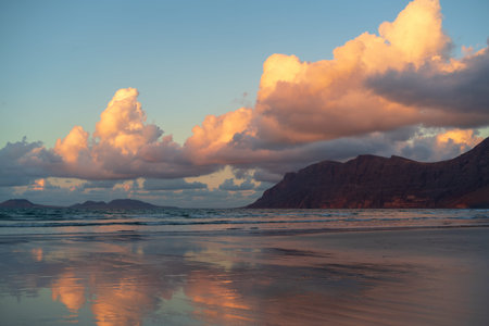 View on Caleta de Famara and the sea as seen from the Famara massif, Lanzarote Island, Canary...