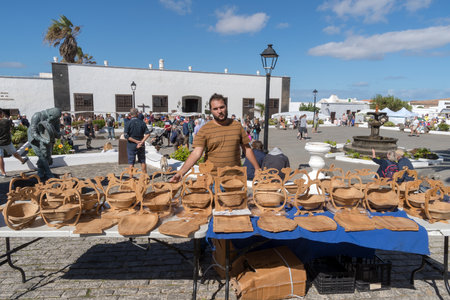 Teguise, Lanzarote, Spain - October 28, 2018: Every Sunday in the squares and cobbled streets of Villa de Teguise, takes place one of the most important popular Canarian marketsのeditorial素材