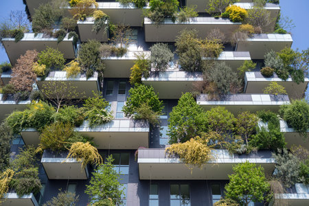 Milan, Italy - April 13, 2019: Close-up view of the Bosco Verticale skyscraper (Vertical Forest) in...