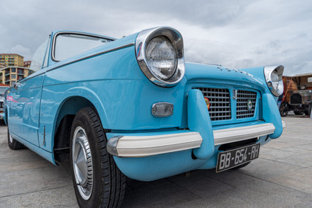 Imperia, Italy - May 19, 2019: Close up detail of Triumph Herald 1200 Convertible parked in a street...