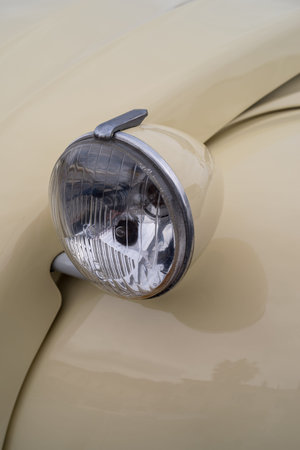 Imperia, Italy - May 17, 2019: Close up detail of a classic old car Citro?i? N 2CV parked in a...