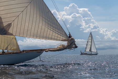 Imperia, Italy - September 7, 2019: Crew members aboard on sailboat Tuiga, flagship of the Monaco...