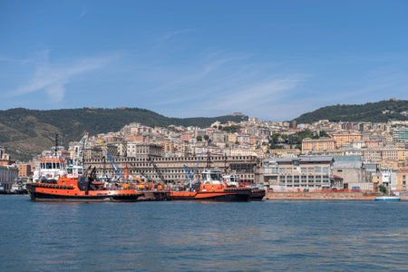 Italy, Liguria, Panoramic view of Genoa from the seaの写真素材