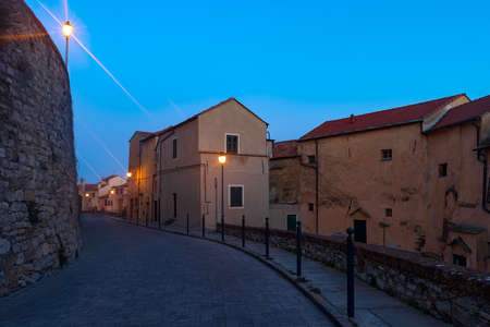 Night scene in the old town of Imperia, seaside city on the Italian Rivieraの写真素材