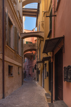 Typical Italian narrow street, Imperia, Liguria regionの写真素材