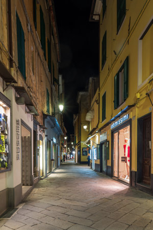 Alassio, Italy - February 26, 2020: View along typical Italian narrow street in Alassio old town, Liguria regionのeditorial素材