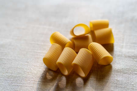 High angle view of Paccheri pasta on tableの写真素材