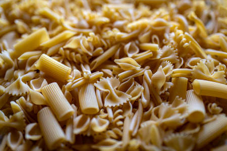 Variety of types and shapes of dry Italian pastaの写真素材